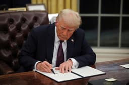 How many pieces of legislation will Trump sign into law in March?